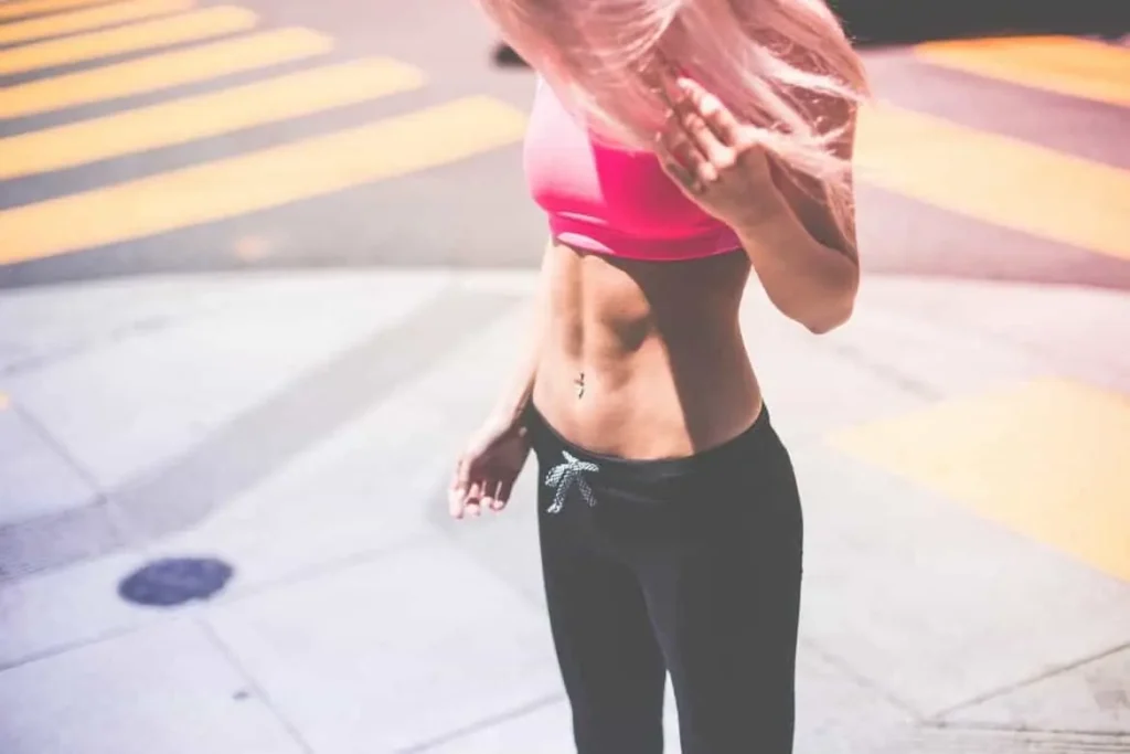 Woman with toned stomach after LA-EMS Body Sculpting Treatment Bicester 